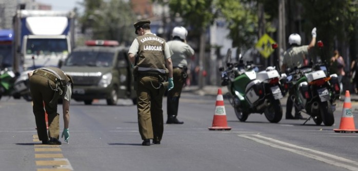 Asalto a banco y posterior balacera en Recoleta dejó a dos carabineros heridos