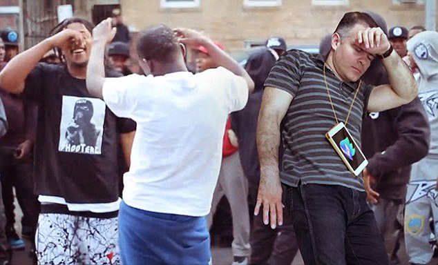 3400E40B00000578-3583162-dancing_in_a_crowd_seeing_his_iPad_turned_into_a_medallion-m-2_1462955044798