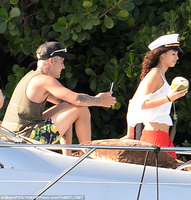 35FDC67B00000578-3677507-Yum_She_also_gripped_onto_a_coconut-a-18_1467832809468