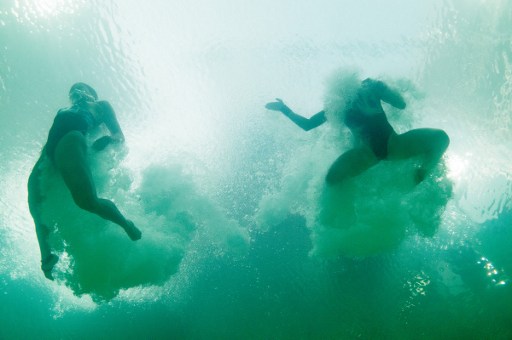In this picture taken with an underwater camera Malaysia's duet Jun Hoong Cheong and Pandelela Rinong Pamg compete in the Women's Synchronised 10m Platform Final during the diving event at the Rio 2016 Olympic Games at the Maria Lenk Aquatics Stadium in Rio de Janeiro on August 9, 2016. / AFP PHOTO / FRANCOIS XAVIER MARIT
