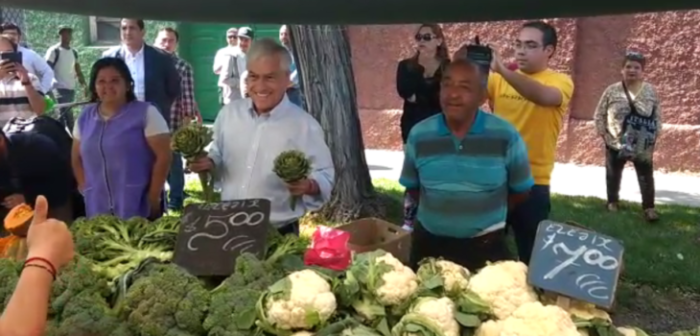 El tenso momento que vivió Piñera en feria de Santiago: vecinos le gritaron 'Guillier'